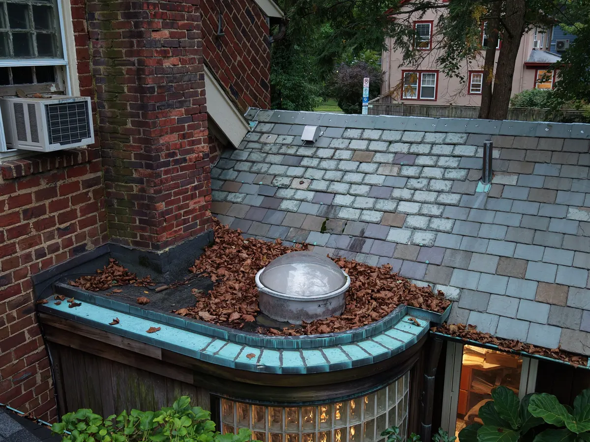 A copper cupola on a slate roof in Princeton, NJ, by Pujols Roofing.